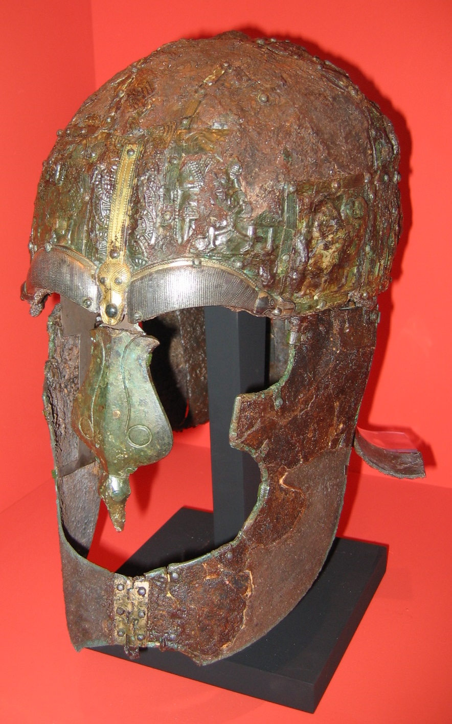 Iron helmet with face guard from a Germanic Iron Age warrior burial